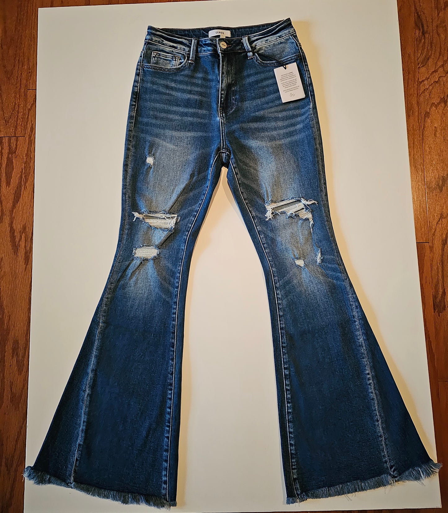 HIGH RISE SUPER FLARE DISTRESSED JEANS